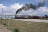 Cuba Ranchuelo Mill 440 Ifrain Alfonso Alco 2-8-0 1637 hauls train across A1 Autopista Nationale.jpg